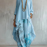 Completo donna stampato con top asimmetrico e pantaloni larghi