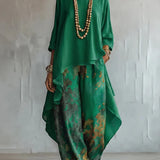 Completo donna stampato con top asimmetrico e pantaloni larghi